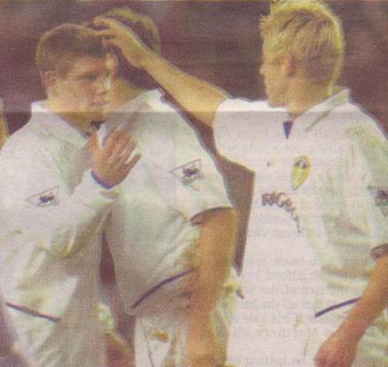 2003 Chelsea Smith congratulates Milner