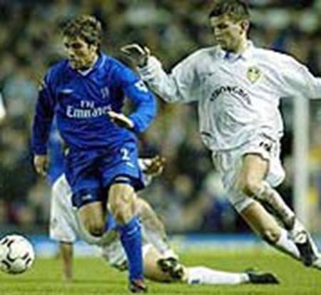2003 Chelsea Bakke chases Enrique de Lucas